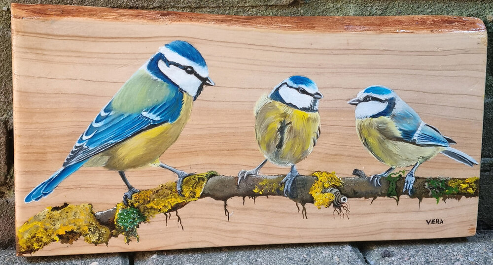Schilderij pimpelmezen op hout 33 x 17 cm.
